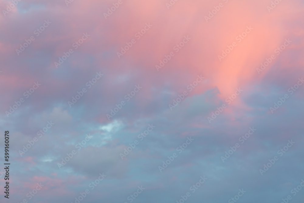 Colorful clouds in the sky at sunset. Background