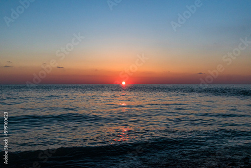 sunset in the sea © pilotrs