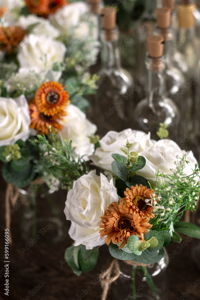 romantic flower bouquet arrangements on wedding party table top