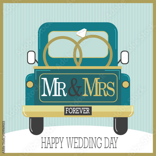 happy wedding day with rings on the car