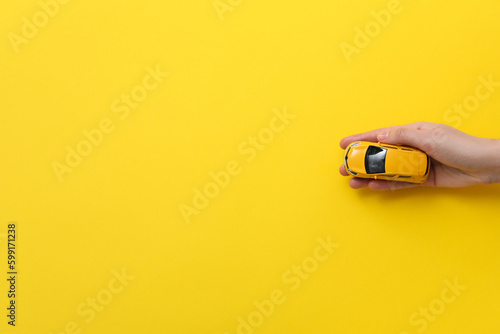 Concept of car purchase and insurance with toy car