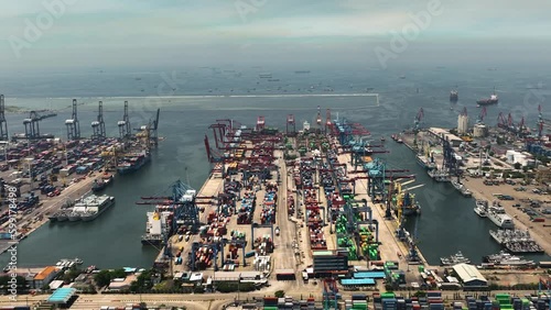 Sea cargo port with containers and cranes. Tanjung Priok port. Indonesia. photo