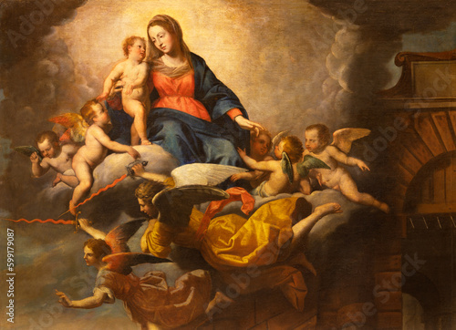 GENOVA, ITALY - MARCH 7, 2023: The detail of Madonna from the painting  Blessed Alexandror Sauli healing from the plague by Domenico Fiasella (1630). photo