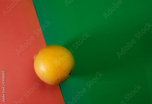 Yellow lemon on a two-tone background