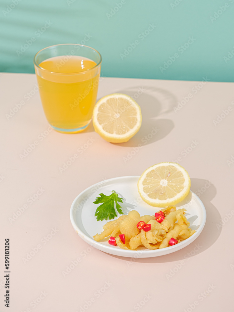 Fototapeta premium Boneless chicken feet(lemon flavor),NO BONE CHICKEN HAND,Chinese traditional spicy snack, chicken feet are boneless and marinated