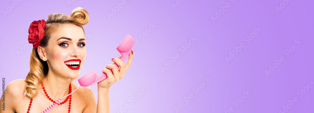 Portrait image - excited happy smile, cheerful woman hold phone, say, talk. Pin up girl open mouth. Rockabilly ad concept, isolated light purple wide background Portrait image - excited happy smile, cheerful woman hold phone, say, talk. Pin up girl open mouth. Rockabilly ad concept, isolated light purple wide background