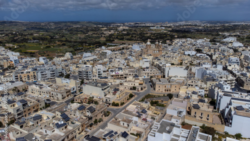 Aerial view of Dingli cliffs. Greeny nature and blue sea and sky. Malta island.