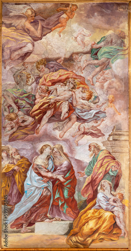 NAPLES, ITALY - APRIL 20, 2023: The fresco of Visitation in church Basilica di Santa Maria degli Angeli a Pizzofalcone by Giovan Battista Beinaschi (1668 - 1675).