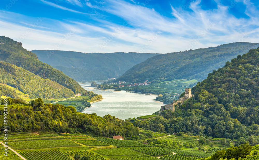 View into the Wachau valley with Danube river and Hinterhaus castle ruins. Austria.