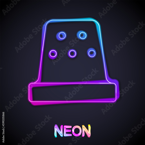 Glowing neon line Thimble for sewing icon isolated on black background. Vector