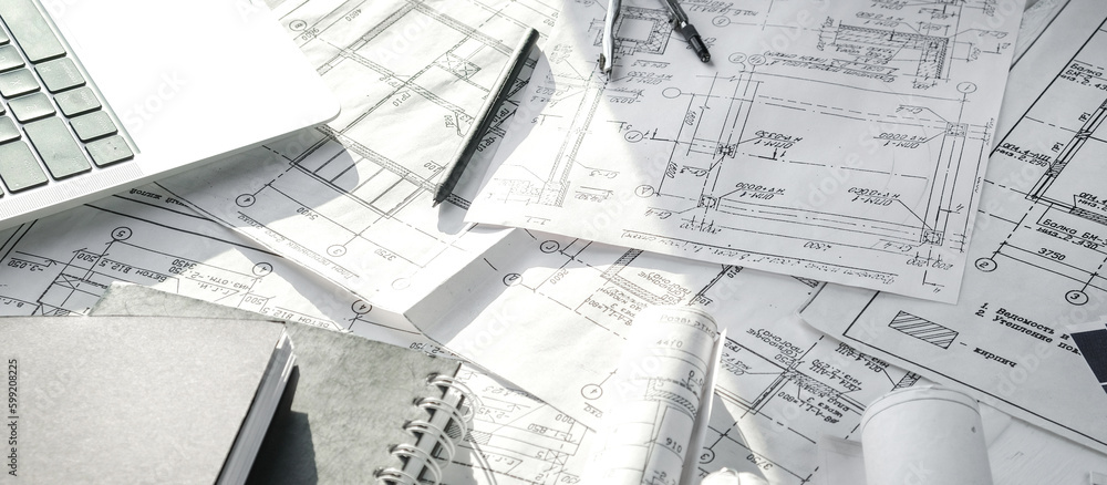 Architects concept, engineer architect designer freelance work on start-up project drawing, construction plan. architect design working drawing sketch plans blueprints and making construction model Architects concept, engineer architect designer freelance work on start-up project drawing, construction plan. architect design working drawing sketch plans blueprints and making construction model