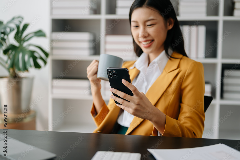 businesswoman hand using smart phone, tablet payments and holding credit card online shopping, omni channel, digital tablet docking keyboard computer at office .. businesswoman hand using smart phone, tablet payments and holding credit card online shopping, omni channel, digital tablet docking keyboard computer at office ..
