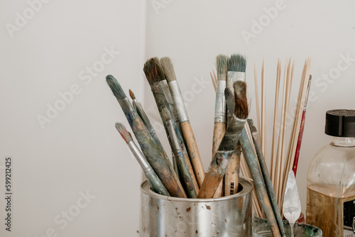 Paintbrushes in an art studio.