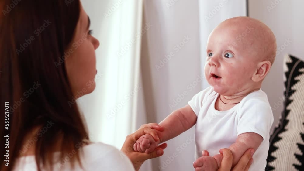 Little boy surprised cute child baby playing with parents at home, hugging kissing laughing smiling. Playful adorable toddler having fun, making faces grimaces. Happy childhood, family concept Little boy surprised cute child baby playing with parents at home, hugging kissing laughing smiling. Playful adorable toddler having fun, making faces grimaces. Happy childhood, family concept