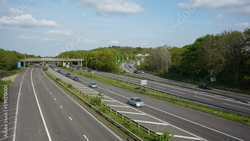 Timelapse of traffic on the Thorpe interchange where the M3 and M25 smart motorways meet. photo