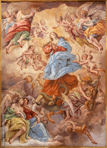 NAPLES, ITALY - APRIL 20, 2023: The fresco of Glory of Immaculate in church Basilica di Santa Maria degli Angeli a Pizzofalcone by Giovan Battista Beinaschi (1668-1675).