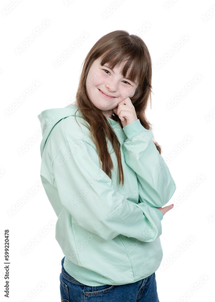 Smiling young girl with Downs syndrom looks at camera. Isolated on white background Smiling young girl with Downs syndrom looks at camera. Isolated on white background