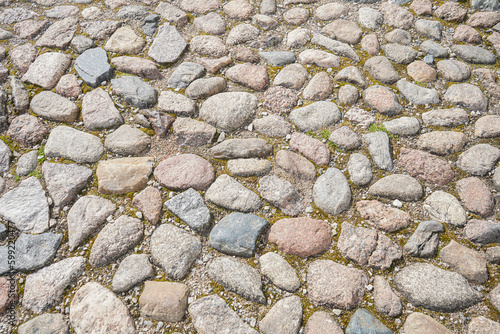 Old stone pavement texture. Abstract background of cobblestone pavement. Seamless texture. Tileable Texture. High quality photo