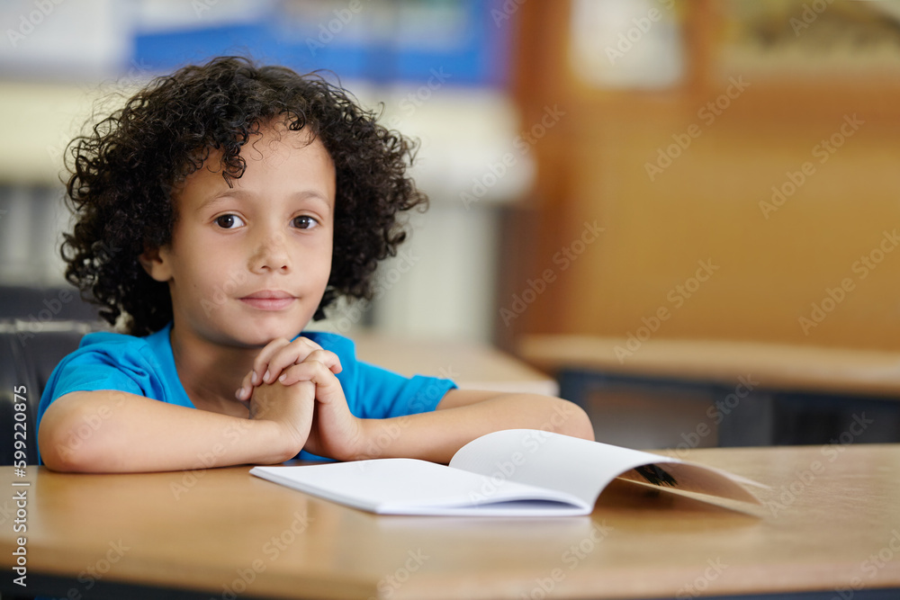 Who ever likes a test. A little boy seated at his desk at school with copyspace. Who ever likes a test. A little boy seated at his desk at school with copyspace.