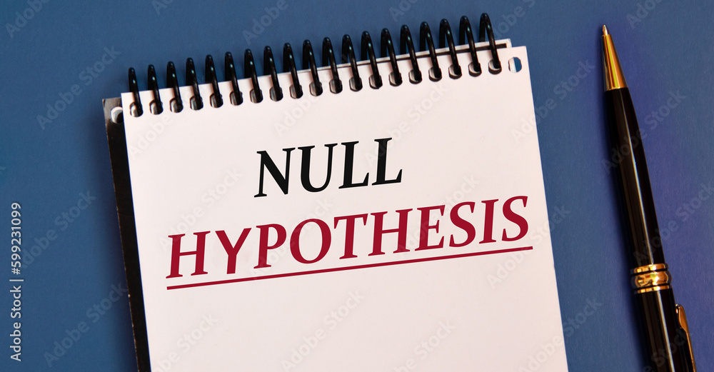 NULL HUPOTHESIS - words in a white notebook on a blue background with a pen NULL HUPOTHESIS - words in a white notebook on a blue background with a pen