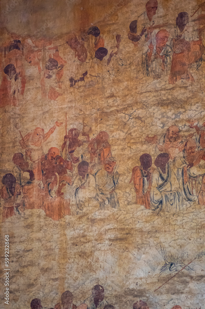 Naklejka premium SHAOLIN TEMPLE, LUOYANG, CHINA - APRIL 10, 2021: Ancient drawingss of the Kung Fu monks inside Shaolin Temple songshan dengfeng city henan province China.