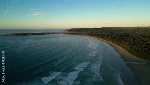 Wide aerial shot of Tautuku Bay in Catlins coastal area | Otago, New Zealand photo