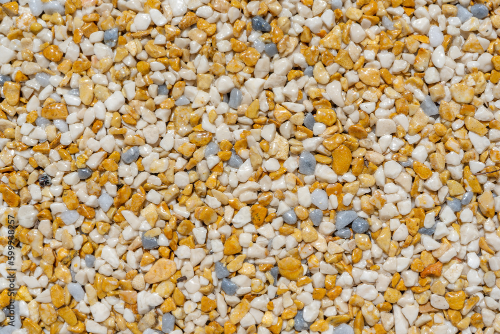 Tiny gravel texture on brown concrete wall. Texture background seamless gravel floor. Tiny gravel texture on brown concrete wall. Texture background seamless gravel floor.