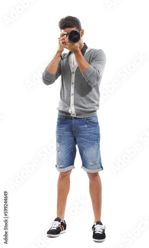 Smile for the camera. Full body shot of a young man taking a picture of you against a white background.