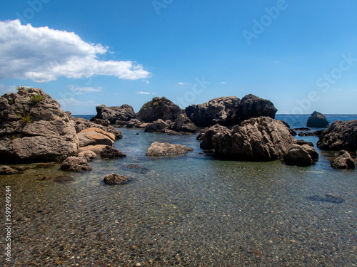 Costa rocciosa di Fondaco del Prete nel mar Jonio photo