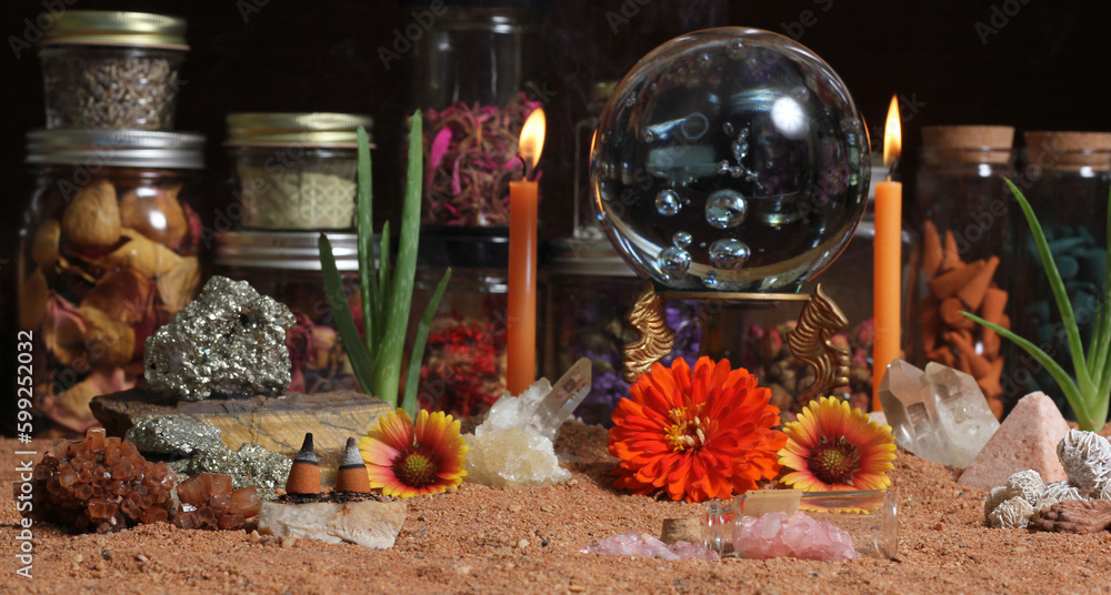 Crystal Ball With Candles and Chakra Stones on Australian Red Sand