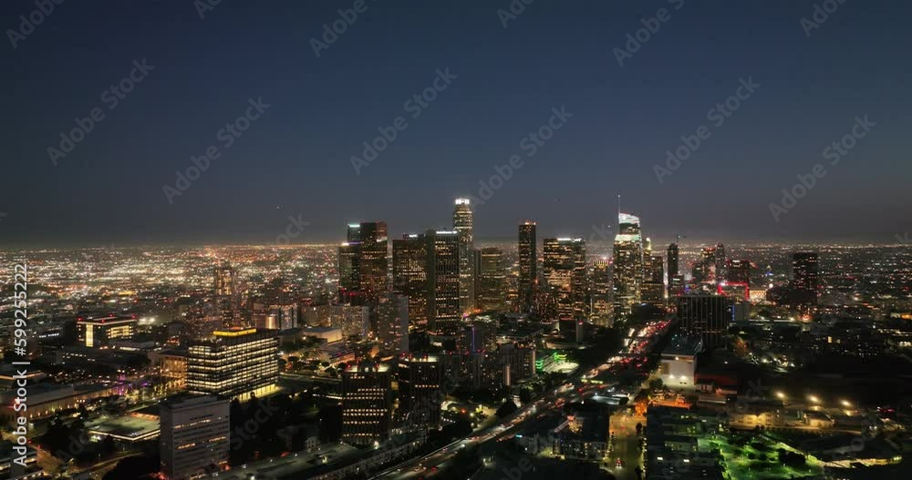 Scenic aerial view of city of downtown Los Angeles skyline at dusk night. Famous skyscrapers. Scenic aerial view of city of downtown Los Angeles skyline at dusk night. Famous skyscrapers.