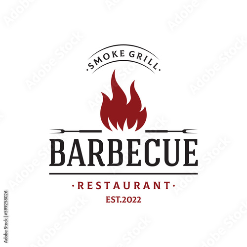 BBQ hot grill vintage typography Logo design with crossed flames and spatula. Logo for restaurant, badge,cafe and bar.