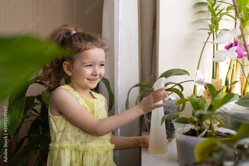 girl taking care of flowers, watering home plants, houseplant at windowsill. child cozy home. Kid gardener spraying orchids with water. gardening floriculture. Green environment girl taking care of flowers, watering home plants, houseplant at windowsill. child cozy home. Kid gardener spraying orchids with water. gardening floriculture. Green environment