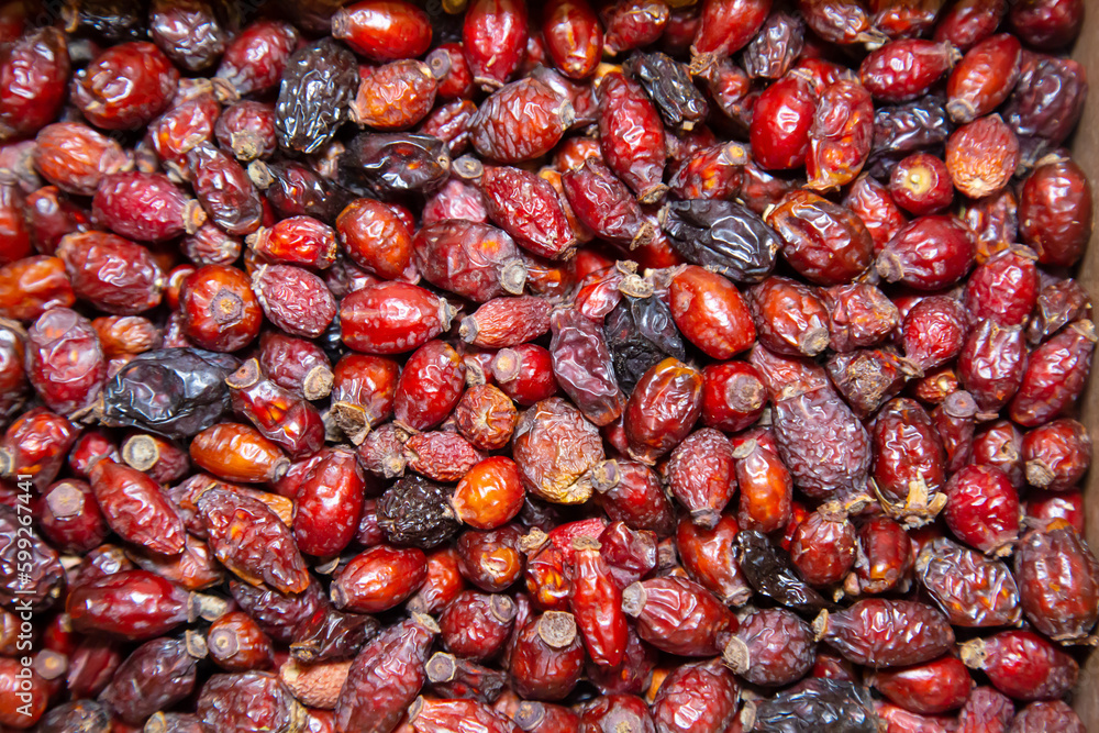 Rosehip fruits are dried brown in color with a beautiful pattern. Fruits nuts vegetables berries useful products agriculture agriculture. Rosehip fruits are dried brown in color with a beautiful pattern. Fruits nuts vegetables berries useful products agriculture agriculture.