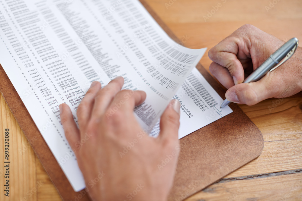 Fototapeta premium These documents need his initials. Cropped image of a businessmans hands initialing some paperwork.