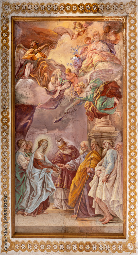NAPLES, ITALY - APRIL 20, 2023: The fresco of  Wedding of Virgin Mary and St. Joseph in church Basilica di Santa Maria degli Angeli a Pizzofalcone by  Giovan Battista Beinaschi (1668-1675).