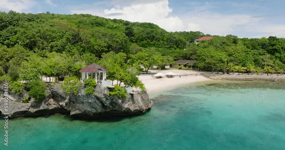 Overview of the natural beauty of Salagdoong resort with a white coasline and turquoise lagoon surface. Siquijor, Philippines. Overview of the natural beauty of Salagdoong resort with a white coasline and turquoise lagoon surface. Siquijor, Philippines.