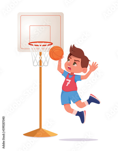 Boy kicks the ball into the basketball basket. Young man playing basketball alone on the court.