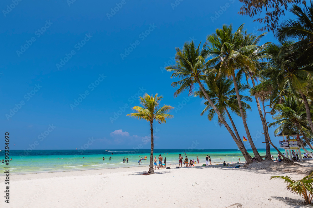 Boracay, Malay, Aklan, Philippines - April 2023: Station 2, part of White Beach in Boracay Island. Boracay, Malay, Aklan, Philippines - April 2023: Station 2, part of White Beach in Boracay Island.