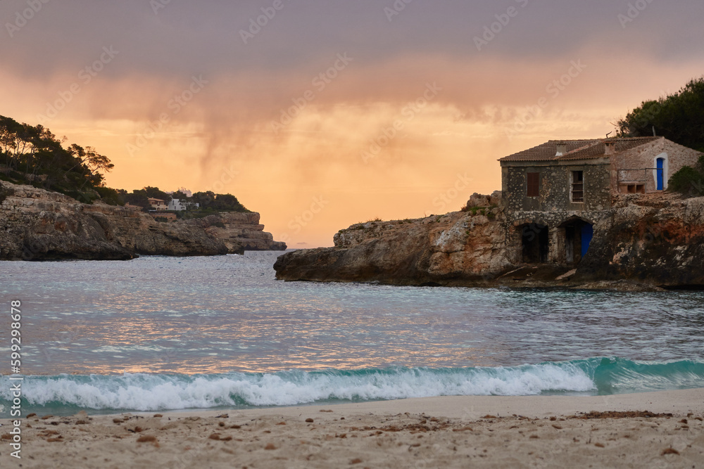 Dawn on the S'Amarador beach on the island of Mallorca. Balearic Islands. Spain