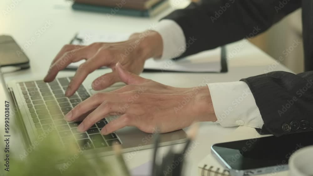 Closeup shot of businessman hands typing on laptop keyboard, searching information, browsing. internet. Closeup shot of businessman hands typing on laptop keyboard, searching information, browsing. internet.