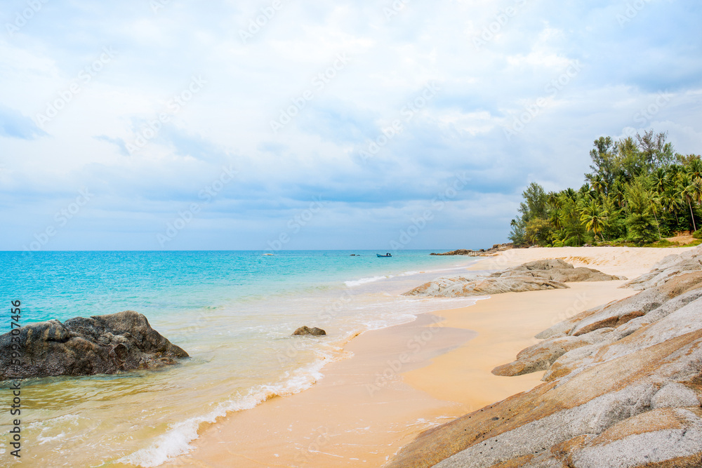 Beautiful landscape of the Indian Ocean coast with a rocky beach on the island of Phuket in Thailand