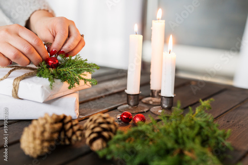 Woman wrapping Christmas gift