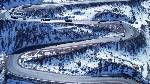 Winding Freeway Road At Andes Mountains Santiago Chile. Road Roundabout. Andes Blizzard Mountain Valley Andes Mountains. Mountain Valley Outdoor Mountain Valley Farellones Snowfall. photo