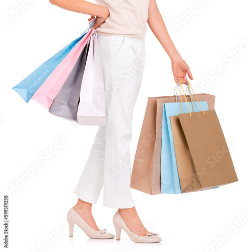 She knows how to shop. a woman holding shopping bags.