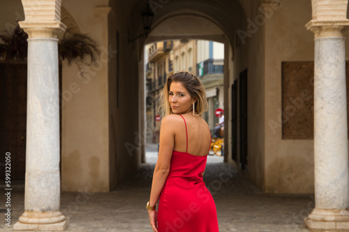woman in red dress © @skuder_photographer