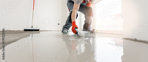 New screed concrete with self leveling cement mortar for floors. Master building renovation home banner photo