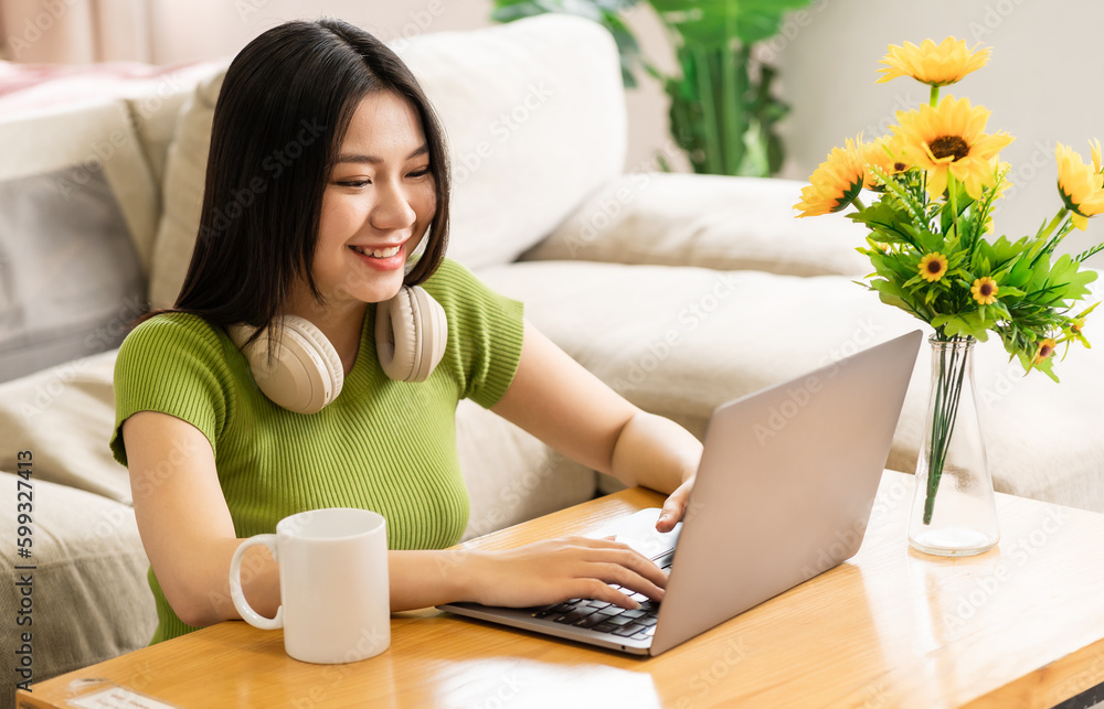 Portrait of a happy asian woman relaxing at home Portrait of a happy asian woman relaxing at home