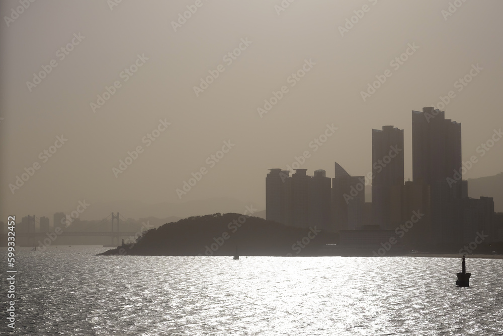 city is covered by yellow dust 