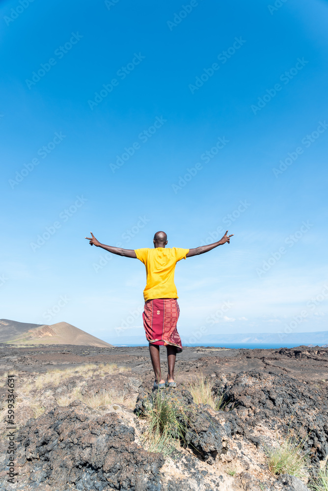 Local Man on Ardoukoba Volcano - The Great African Rift, Djibouti, Horn of Africa Local Man on Ardoukoba Volcano - The Great African Rift, Djibouti, Horn of Africa